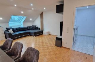 Wohnung kaufen in 75233 Tiefenbronn, Tiefenbronn - 3-Zimmer- Dachgeschosswohnung mit Garten & Garage in Tiefenbronn