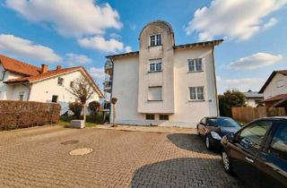 Wohnung kaufen in 35428 Langgöns, Langgöns - Charmante Dachgeschosswohnung mit Einbaumöbeln & Doppelparker