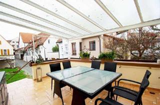 Wohnung kaufen in 71665 Vaihingen an der Enz, Stadtmitte trifft Grün: 4 Zimmer mit Traumgarten und Terrasse