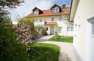 Wohnung kaufen in 82178 Puchheim, Wohnen Sie auf ganz besondere Weise in Puchheim mit eigenem Garten in einem 2 Familienhaus!