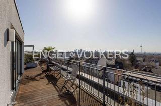 Wohnung kaufen in 60435 Preungesheim, Moderne 2,5-Zimmer-Maisonette Wohnung mit großer Dachterrasse und spektakulärem Skylineblick