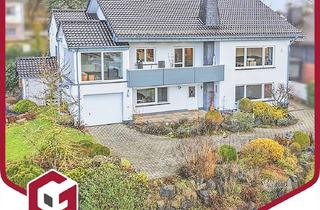 Einfamilienhaus kaufen in 56651 Niederzissen, Stilvolles Einfamilienhaus mit Einliegerwohnung, Garage und Kaminofen in traumhafter Hanglage