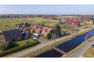 Haus kaufen in 26639 Wiesmoor, Großes Anwesen mit zwei Wohneinheiten in idyllischer, ruhiger Kanallage in Wiesmoor