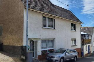 Einfamilienhaus kaufen in 56761 Urmersbach, Charmantes, freistehendes Einfamilienhaus mit Einliegerwohnung und Wintergarten – vielseitig nutzbar