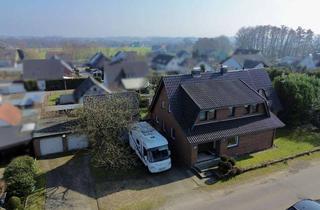 Haus kaufen in 32609 Hüllhorst, Viel Platz für Familie, Autos und Ideen - Haus mit Doppelgarage & großem Grundstück in Hüllhorst