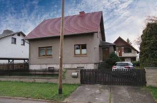 Einfamilienhaus kaufen in 99887 Hohenkirchen, Einfamilienhaus mit Garten und Nebengebäude