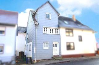 Doppelhaushälfte kaufen in 34590 Wabern, Gemütliche Doppelhaushälfte mit Anbauhaus und Garage in Wabern Niedermöllrich