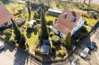 Doppelhaushälfte kaufen in 13503 Heiligensee, Familienfreundliche Doppelhaushälfte mit Garten und Entwicklungspotenzial in Berlin-Heiligensee