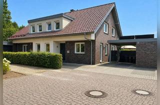Doppelhaushälfte kaufen in 46325 Borken, Ruhig gelegen, clever geschnitten – moderne Doppelhaushälfte mit Keller und Carport