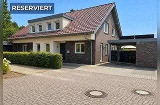Doppelhaushälfte kaufen in 46325 Borken, Ruhig gelegen, clever geschnitten – moderne Doppelhaushälfte mit Keller und Carport