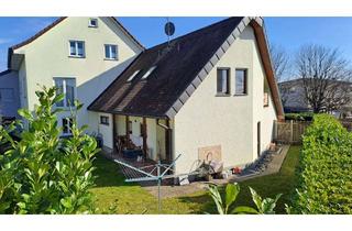 Einfamilienhaus kaufen in Bahnhofstraße 15/2, 79588 Efringen-Kirchen, Modernes Einfamilienhaus mit Garten, Terrassen und Garage in schöner Lage von Efringen-Kirchen