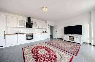 Wohnung kaufen in 26817 Rhauderfehn, Eigentumswohnung mit Balkon und moderner Küche in zentraler Lage von Rhauderfehn
