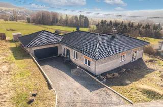 Haus kaufen in 57648 Unnau, Neubau aus 2021! Bungalow für Gartenliebhaber in idyllischer Aussichtslage