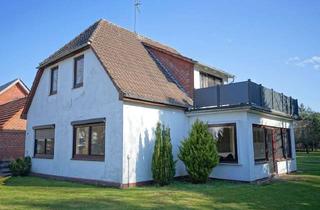 Einfamilienhaus kaufen in 27619 Schiffdorf, Volksbank Immobilien:Einfamilienhaus mit Einliegerwohnung auf herrlichem Grundstück