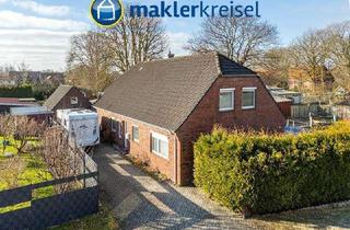 Haus kaufen in 26556 Nenndorf, Westerholt: Großzügiges Wohnhaus mit Garage und großem Grundstück in Nenndorf!