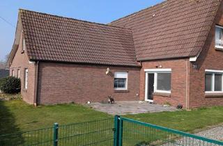 Haus kaufen in 26624 Südbrookmerland, Südbrookmerland - Modernisiertes Wohnhaus in absolut ruhiger Alleinlage - 238 m² Wo