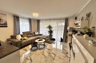 Wohnung kaufen in 71120 Grafenau, Stilvolle 3-Zimmer-Erdgeschosswohnung mit Garten