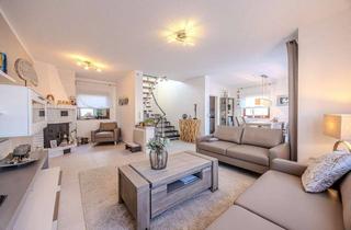 Einfamilienhaus kaufen in 61184 Karben, Gepflegtes Einfamilienhaus mit Südterrasse und Weitblick in familienfreundlicher Lage