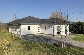 Haus kaufen in 35096 Weimar, Neuwertiger Bungalow mit Gartenfreiraum & moderner Wohnatmosphäre!