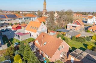 Haus kaufen in 26817 Rhauderfehn, Attraktives Zweifamilienhaus im Zentrum von Rhauderfehn !