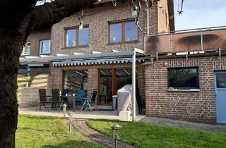 Haus kaufen in 46537 Dinslaken, Seltene Gelegenheit im Blumenviertel: Zweifamilienhaus mit Garten, Kamin & Mieteinnahmen