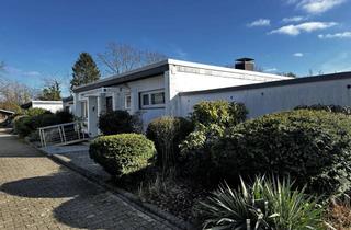 Haus kaufen in Sieglarer Straße 35, 51147 Lind, Einseitig angebauter Bungalow in Köln Porz -Lind mit 3 Garagen und Sauna