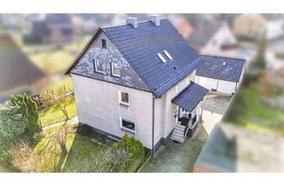 Haus kaufen in 30982 Pattensen, Kapitalanlage in Pattensen - teilmodernisiertes 3 Familienhaus mit 3 Garagen und schönem Grundstück