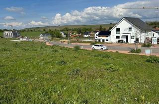 Grundstück zu kaufen in 55278 Mommenheim, Traumhaftes Baugrundstück mit direkter Feldrandlage im Neubaugebiet mit Blick über Mommenheim