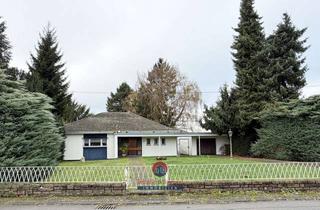 Einfamilienhaus kaufen in Arienheller Straße 29, 56598 Rheinbrohl, RHEINBROHL: FREISTEHENDES EINFAMILIENHAUS MIT VIEL POTENTIAL AUF PARKÄHNLICHEM GRUNDSTÜCK - GARAGE