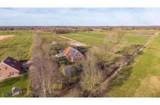 Haus kaufen in 26624 Südbrookmerland, Energetisch saniertes Wohnhaus in Moorhusen – Resthof mit Scheune, Stall und Weideland