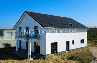Einfamilienhaus kaufen in 55268 Nieder-Olm, Neubau-Einfamilienhaus in exklusiver Wohnlage direkt am Weinberg mit Fernsicht