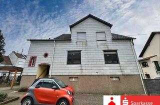 Haus kaufen in 66589 Merchweiler, Zweifamilienhaus mit Einliegerwohnung in Merchweiler