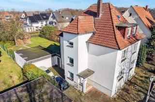 Haus kaufen in 33330 Gütersloh, Gütersloh - Charmantes Zweifamilienhaus mit traumhaftem Grundstück, Doppelgarage und Balkon in ruhiger Lage vom Mohnspark!