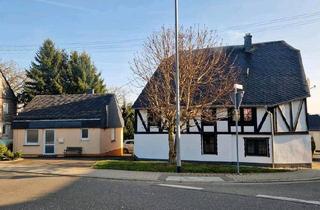 Haus kaufen in 55624 Rhaunen, Rhaunen - Zwei Häuser mit großem Garten und Teich zu verkaufen in Gösenroth