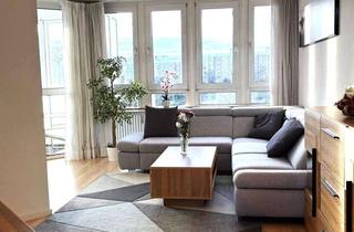 Wohnung kaufen in 82024 Taufkirchen, Attraktive 3-Zimmer-Eigentumswohnung mit Wintergarten und Blick ins Grüne in Taufkirchen