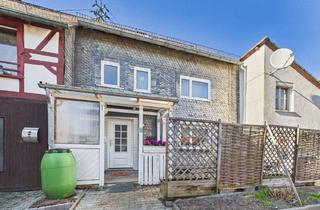 Einfamilienhaus kaufen in 56348 Weisel, Charmantes Einfamilienhaus mit Nebengebäude, Garage und Scheune in Weisel zu verkaufen