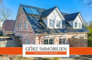Haus kaufen in 24558 Henstedt-Ulzburg, Traumhaus - Neuwertige KfW 55 DHH mit Friesengiebel und Gaubenin Feldrandlage!