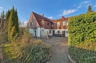 Doppelhaushälfte kaufen in 23701 Eutin, Modernisierungsbedürftige Doppelhaushälfte in zentrumsnaher Lage von Eutin