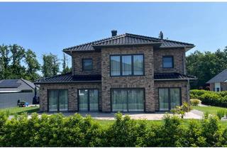 Haus kaufen in 26197 Großenkneten, Modernes & neuwertiges Wohnen: Exklusives Einfamillienhaus mit Doppelgarage & Sonnenterasse