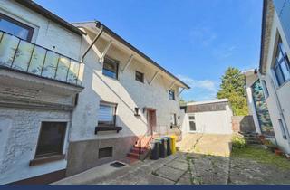 Einfamilienhaus kaufen in 52249 Eschweiler, Charmantes Einfamilienhaus mit Garten und 5 Garagen in zentraler Lage von Eschweiler