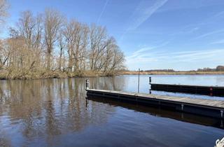 Haus kaufen in 25794 Tielenhemme, Ferienhaus unter Reet mit 12m Bootsliegeplatz -Traumblick und Ruhe garantiert