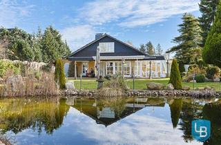 Einfamilienhaus kaufen in 23623 Ahrensbök, Einzigartiges Wohnen auf weitläufigem Traumgrundstück – Exklusives Einfamilienhaus mit Schwimmteich