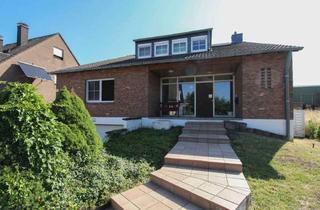 Anlageobjekt in 41352 Korschenbroich, Gemütliches Zweifamilienhaus: Einladendes Zweifamilienhaus auf mehreren Ebenen