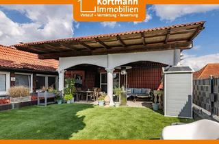 Immobilie kaufen in 48268 Greven, Vielseitiges Wohn- und Geschäftshaus mit sonnigem Lebensgefühl