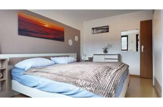 Wohnung kaufen in 23746 Kellenhusen, „Kompakt investieren - Ferienimmobilie mit Südbalkon + separater Souterrain-Einheit“