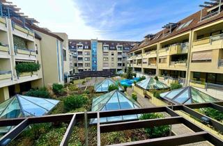 Wohnung kaufen in 68165 Mannheim, Stilvolle Stadtwohnung mit Innenhof-Oase in Toplage der Mannheimer Quadrate