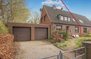 Doppelhaushälfte kaufen in 25578 Dägeling, Gepflegte Reiheneckhaus auf großzügigem Naturgrundstück in Dägeling