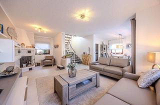 Einfamilienhaus kaufen in 61184 Karben, Karben - Gepflegtes Einfamilienhaus mit Südterrasse und Weitblick in familienfreundlicher Lage