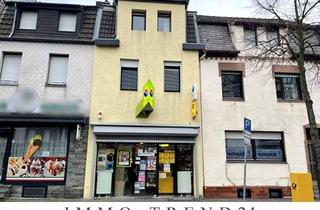 Haus kaufen in 52249 Eschweiler, Eschweiler / Weisweiler - Stadthaus inkl. Wohneinheit mit Gewerbeeinheit, zwei Garagen - Arbeiten und Leben unter einem Dach.