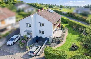 Haus kaufen in 63694 Limeshain, Limeshain - Zwei Wohnungen - viele Möglichkeiten: Familienhaus mit Terrasse, Balkon & Kamin